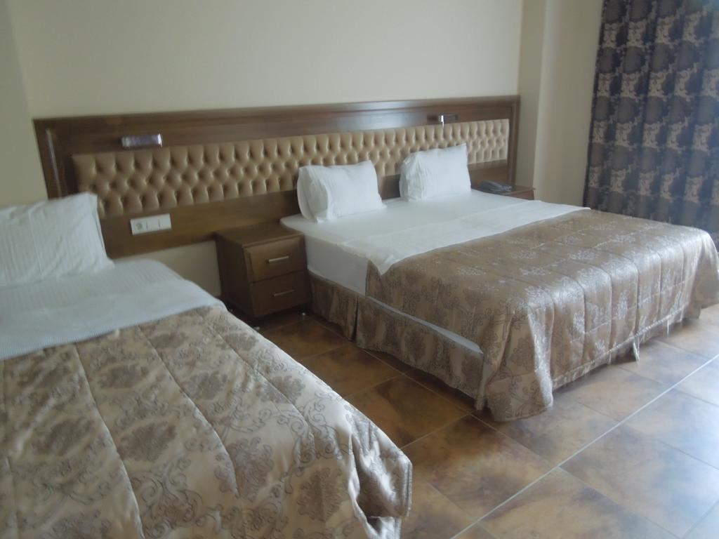 Masi Hotel İmroz Rom bilde