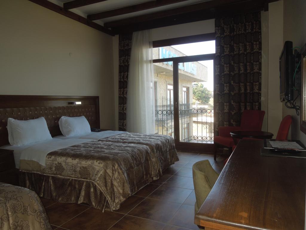 Masi Hotel İmroz Rom bilde