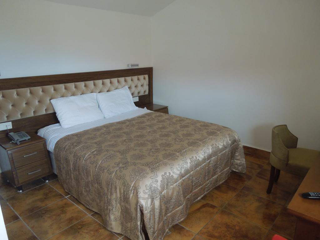 Masi Hotel İmroz Rom bilde