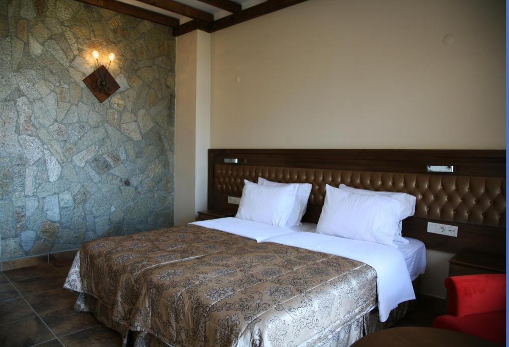 Masi Hotel İmroz Rom bilde